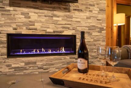 Home Exchange in Fairway, NC, ultra-modern stone fireplace