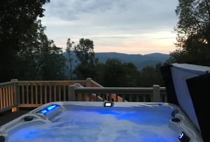 Home Exchange in Fairview, NC, hot tub with a sunset view