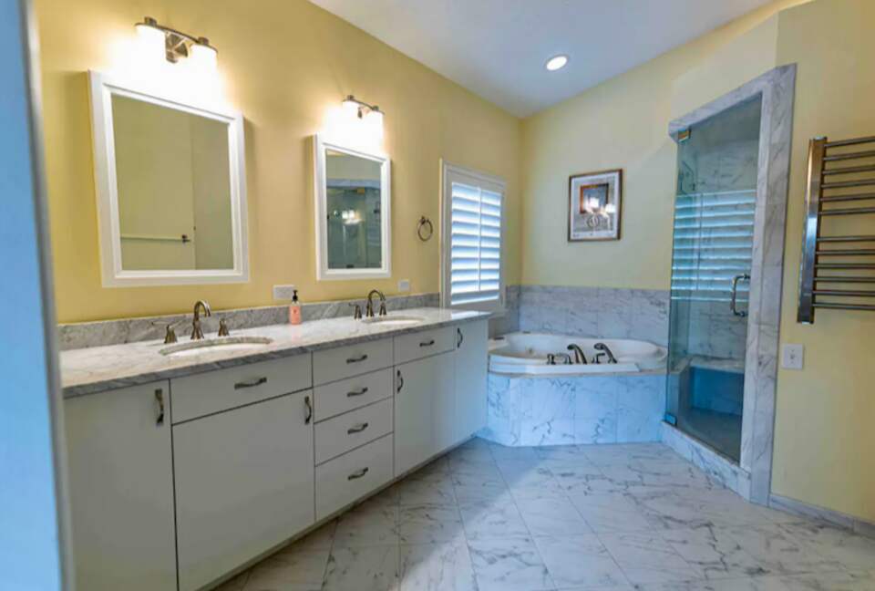 Master bathroom with walk-in shower and tub