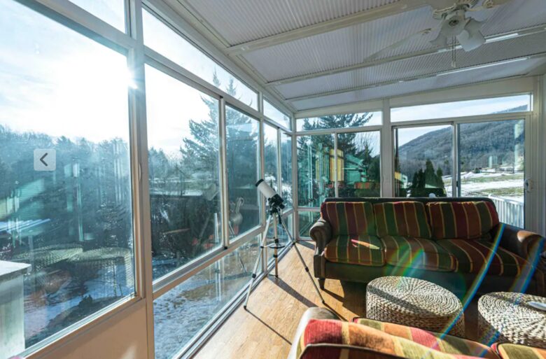 Sunroom with telescope