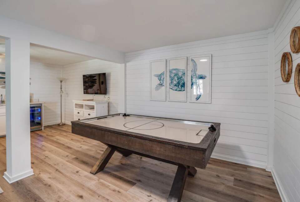 Basement playroom with air hockey and den