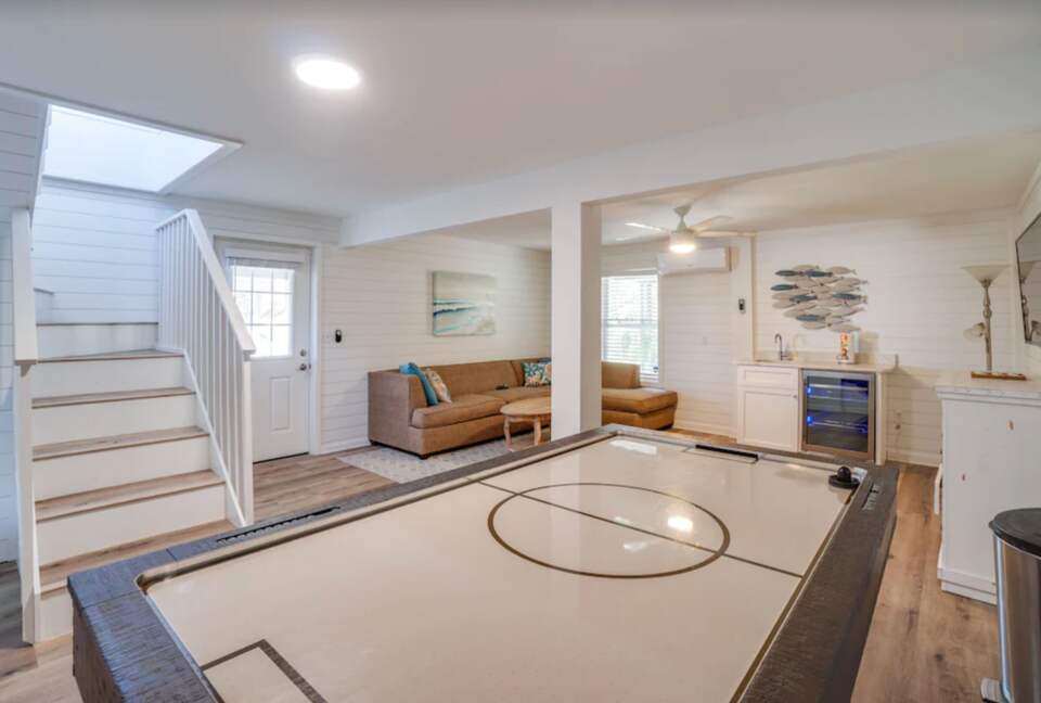 Basement playroom with air hockey and den