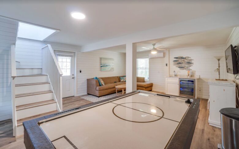 Basement playroom with air hockey and den