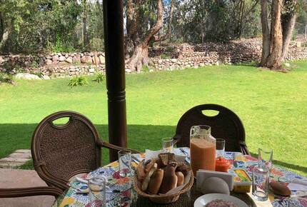 Home Exchange in Urubamba, Cusco, Peru, dining table with shade!