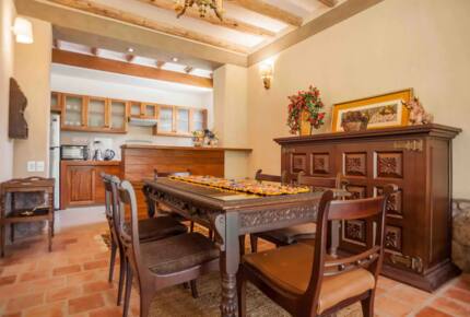 Home Exchange in Urubamba, Cusco, Peru, rich wood dining table