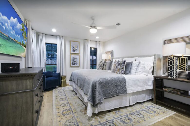 Spacious master bedroom with flat screen TV