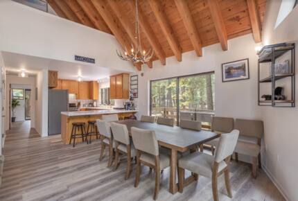 Home Exchange in Tahoma, CA, open concept living space with wood beams