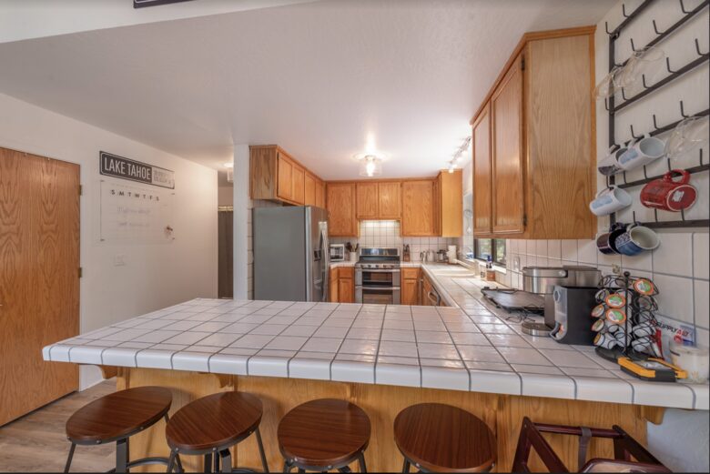Home Exchange in Tahoma, CA, kitchen with upgrades and bar seating