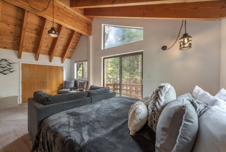 Home Exchange in Tahoma, CA, master bedroom with balcony and king bed