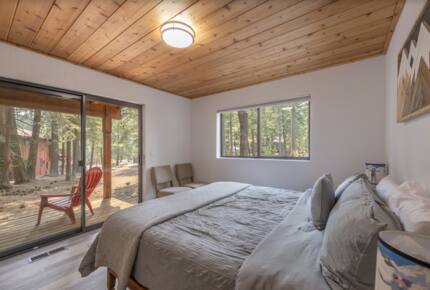 Home Exchange in Tahoma, CA, guest bedroom with deck view