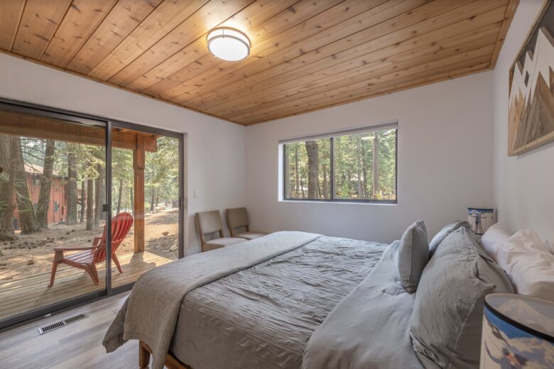 Home Exchange in Tahoma, CA, guest bedroom with deck view