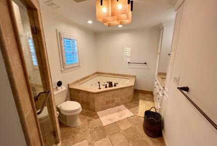 Home Exchange in Virginia Beach, VA master bathroom with soaker tub