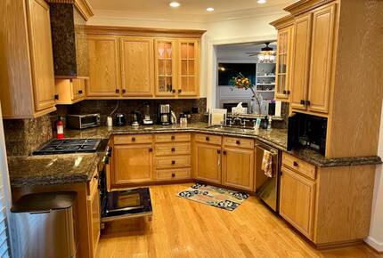 Home Exchange in Virginia Beach, VA kitchen with a TV view