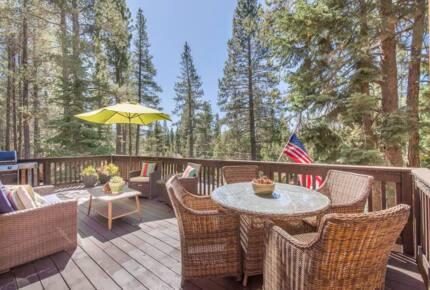 Home Exchange in Truckee, CA, front deck overlooking luscious trees