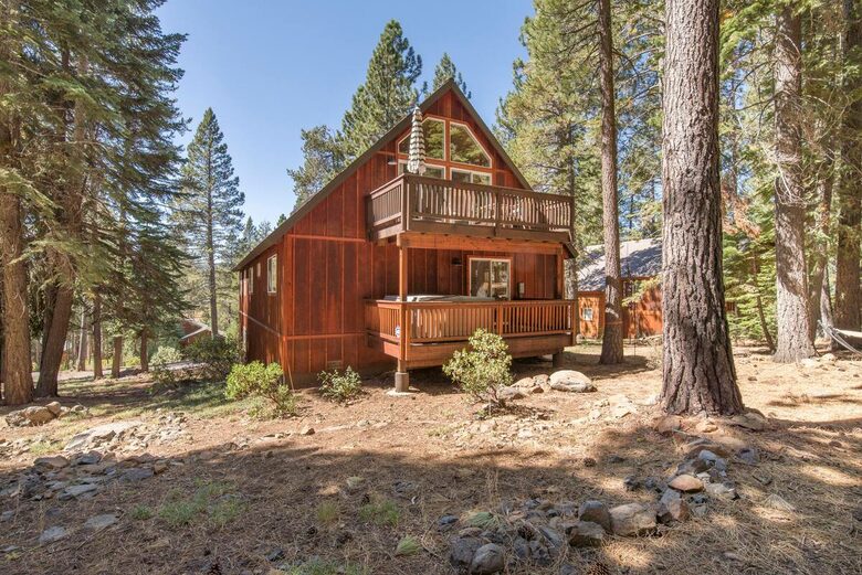 Home Exchange in Truckee, CA, woodsy backyard with hot tub deck