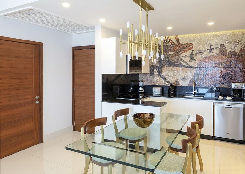 Home exchange in Los Cabos at Garza Blanca Resort, glass dining table