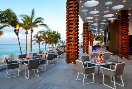 Home exchange in Los Cabos at Garza Blanca Resort, outdoor dining