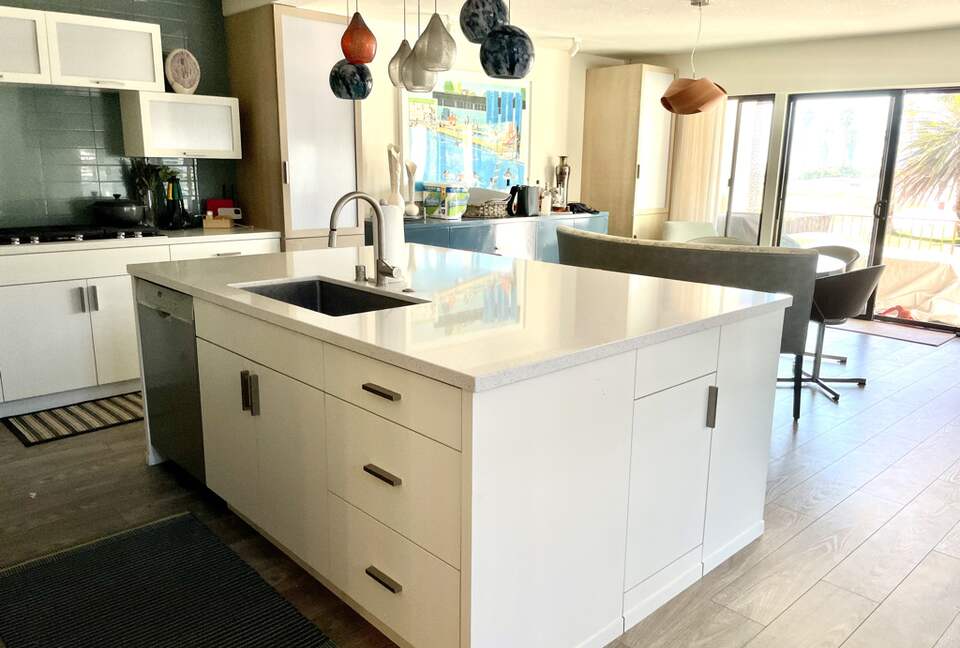 Home Exchange in Oxnard, CA modern kitchen with fun lighting