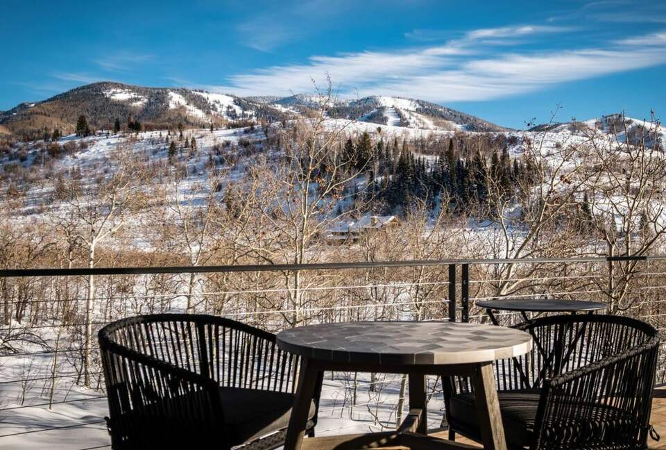 Outdoor breakfast table with mountain views