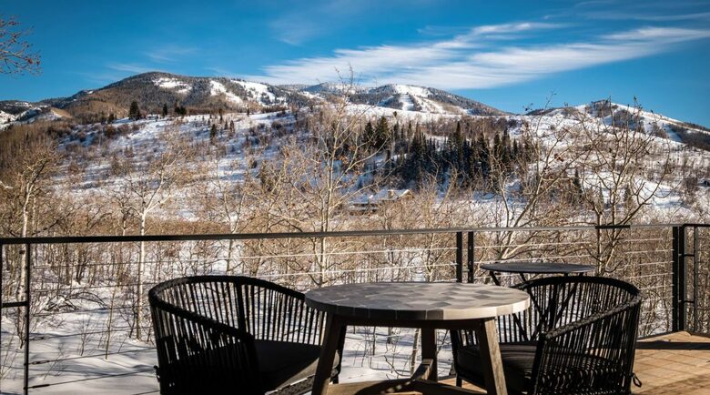Outdoor breakfast table with mountain views