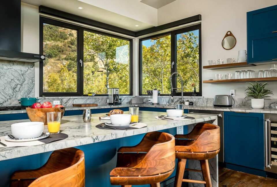 Stunning kitchen with large island and eat-in bar