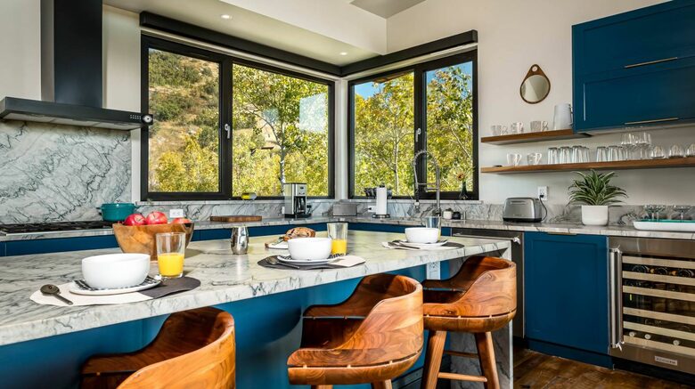 Stunning kitchen with large island and eat-in bar