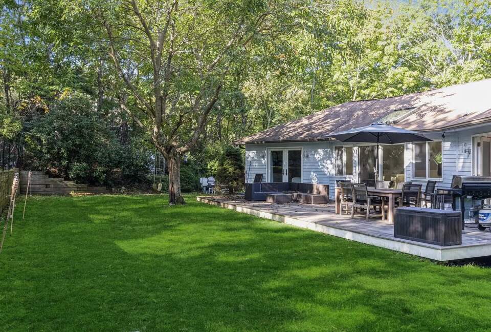 Home Exchange in Sag Harbor, NY lush lawn for yoga or playing ball