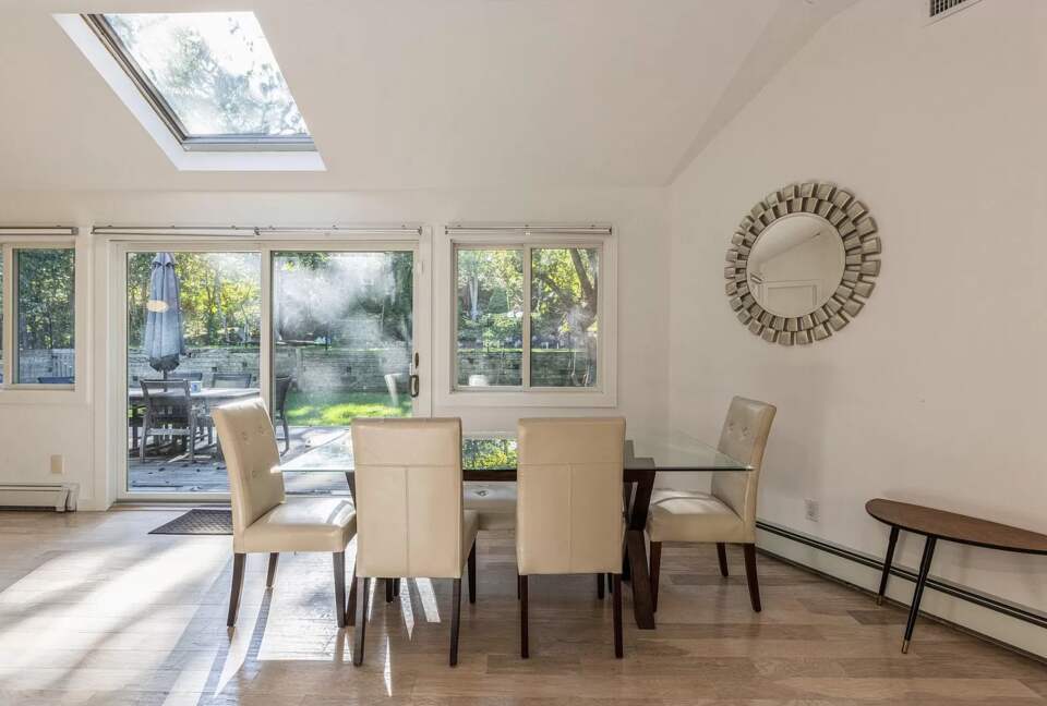 Home Exchange in Sag Harbor, NY dining room with skylight