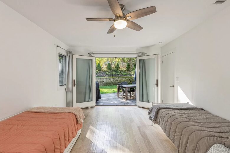 Home Exchange in Sag Harbor, NY guest bedroom with deck access