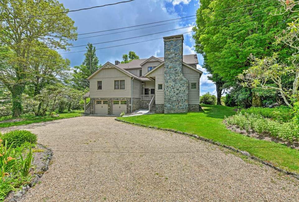 Parking for 5 vehicles is provided in the driveway