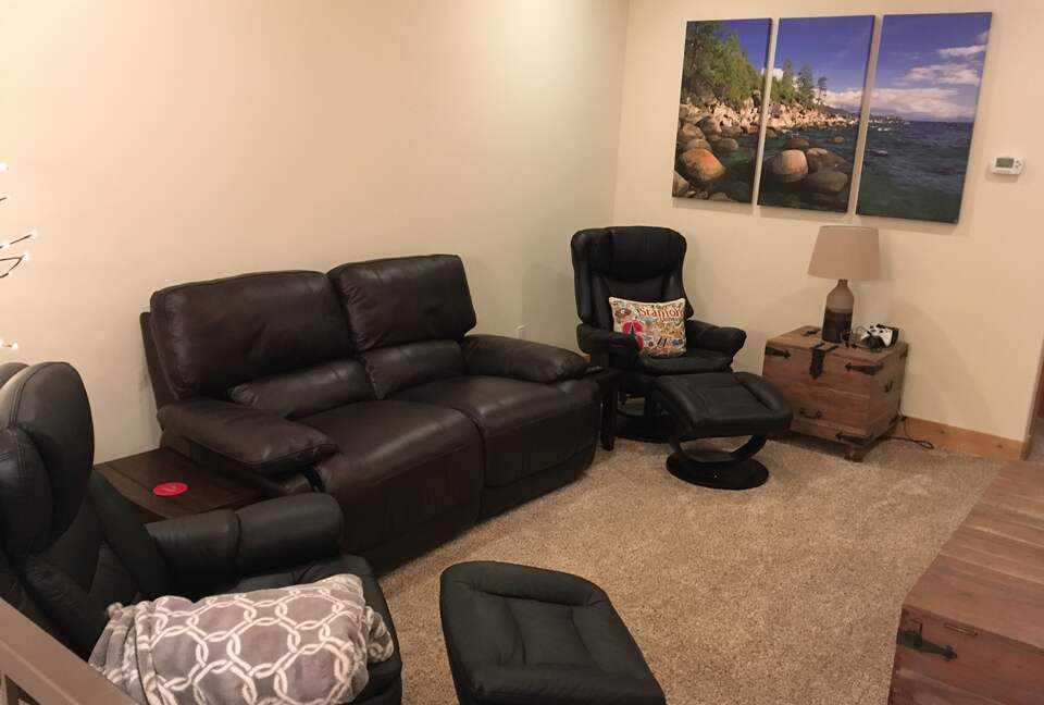 2nd floor family room, recliners and TV on opposite wall.