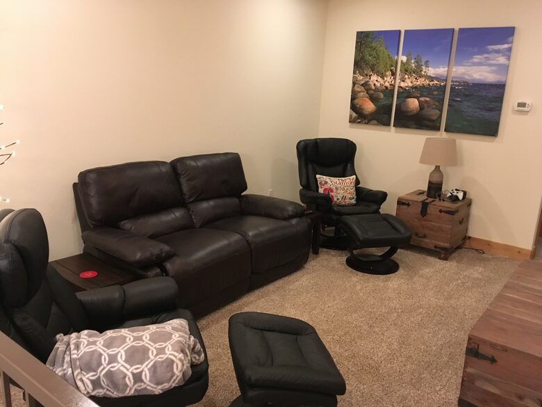 2nd floor family room, recliners and TV on opposite wall.