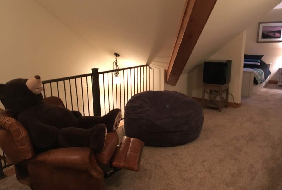 3rd floor game room, twin beds at far end.