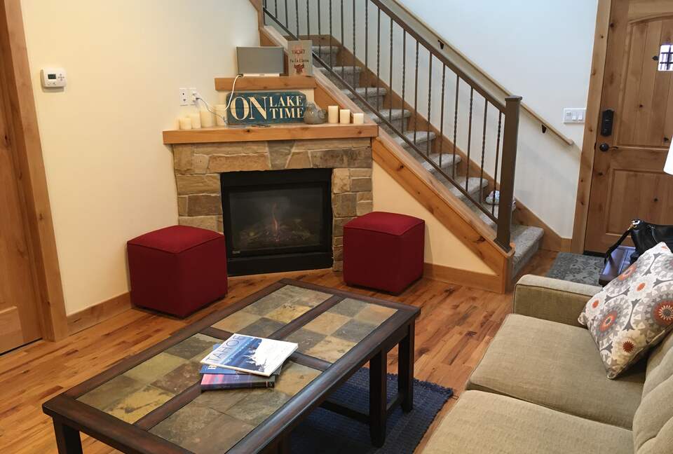 lower fireplace, 1/2 bath on right.