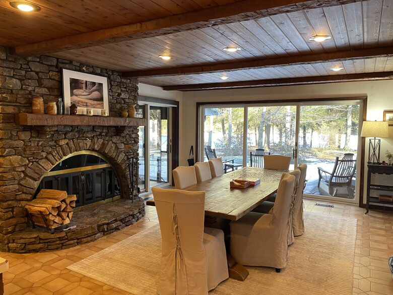 Home Exchange in Muncy Valley, PA, dining room with fireplace and view