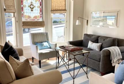 Home Exchange in Pacific Grove, CA, living room with plenty of seating