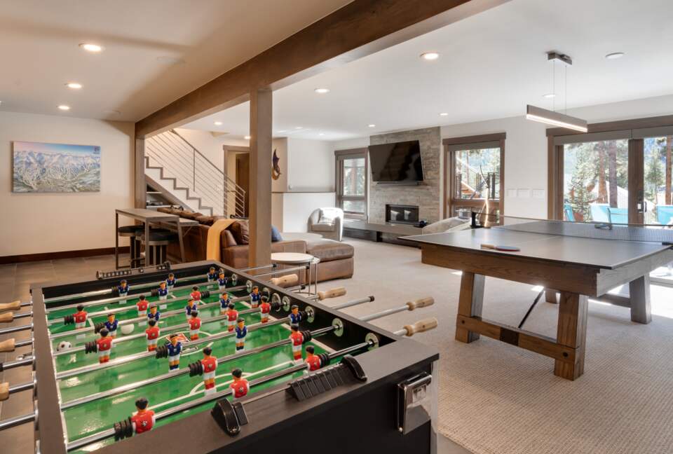 Lower level den and play room with foosball and ping pong