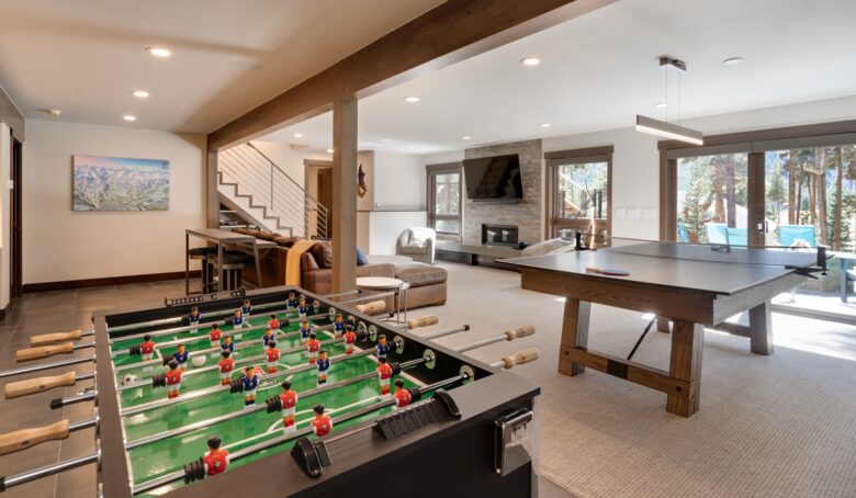 Lower level den and play room with foosball and ping pong