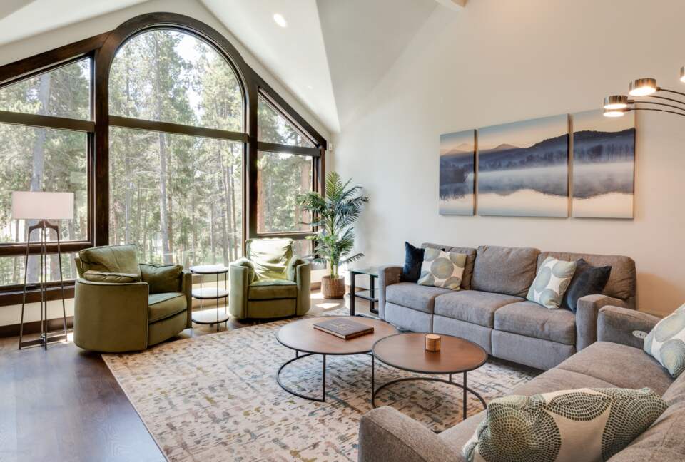 Massive great room with forest views