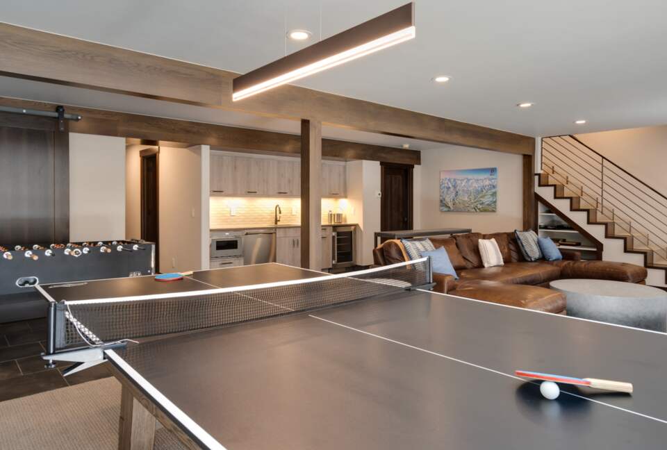 Lower level den and play room with foosball and ping pong