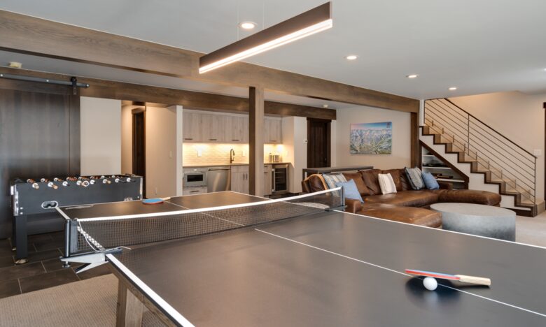 Lower level den and play room with foosball and ping pong