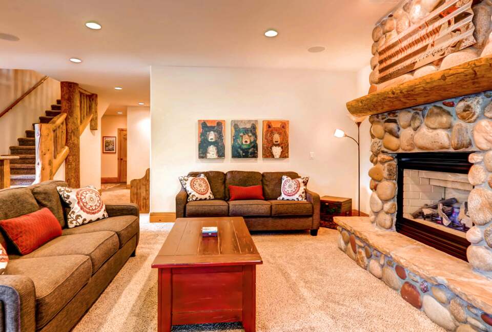 Lower level living room with fireplace
