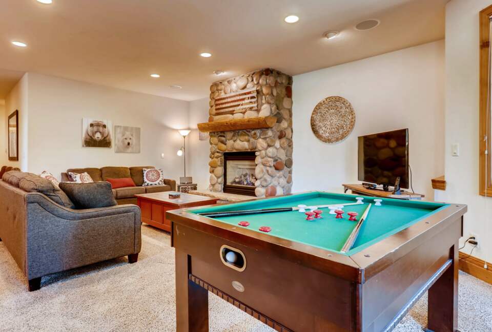 Lower level living room with pool table
