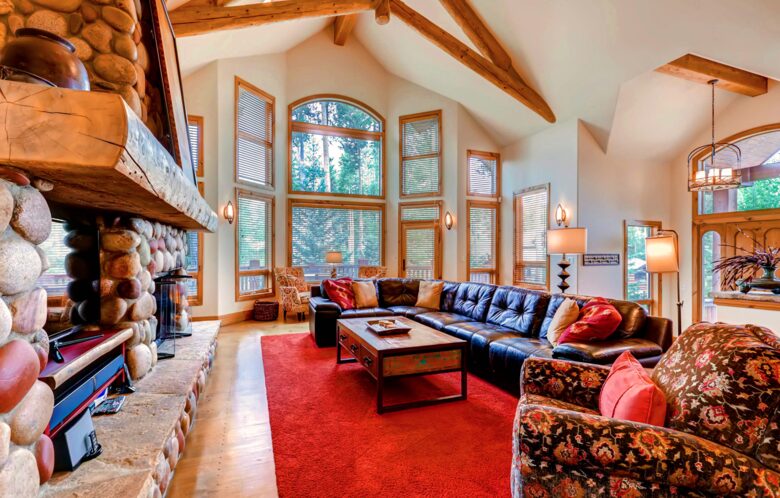 Open living room with forest views