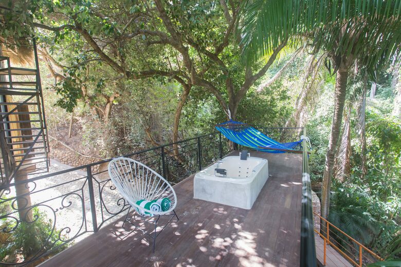 Home Exchange in Sayulita Nay. Mexico, master deck with tub & hammock