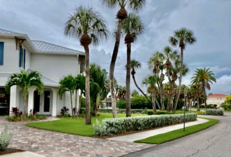 Home Exchange in Clearwater Beach, FL, entry way with palm trees