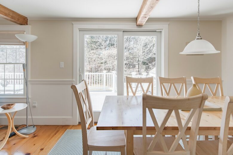 Bright Sunny Dining Area Seats 8 and Opens up to Back Deck
