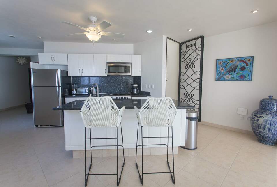 Home Exchange in Sayulita, Nay., Mexico kitchen with counter seats