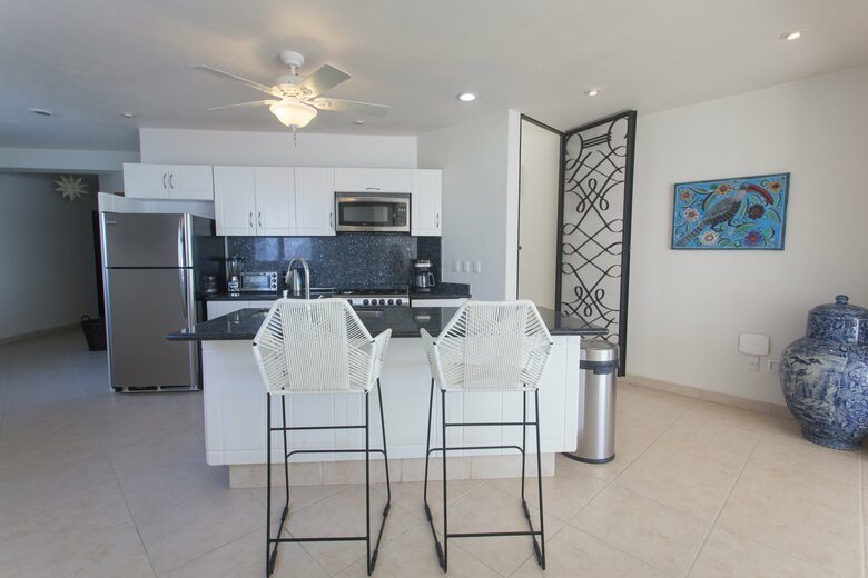 Home Exchange in Sayulita, Nay., Mexico kitchen with counter seats