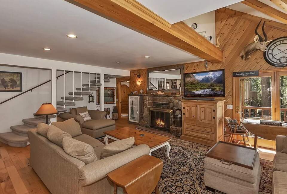 Open living room with fireplace and views